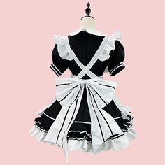 Japanese Lolita Maid Dress Condition: Brand NewColor: BlackSize: S-5XLMaterial: Cotton and PolyesterSleeves: Short SleevesIncluded: Dress+Apron+Headwear+Bow*2 Harajuku Style Black Costume For Costume Party, Black Harajuku Style Costume For Costume Party, White Short Sleeve Dress For Cosplay, Black Harajuku Style Cosplay Costume For Role Play, Black Harajuku Cosplay Costume For Role Play, Ruffled Mini Dress For Cosplay, Mini Dress With Ruffles For Cosplay, Mini Length Ruffled Dress For Cosplay, Mini Length Dress With Ruffles For Cosplay