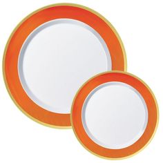 two orange and white plates sitting next to each other