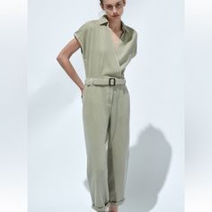 New Zara Denim Jumpsuit. Button And Zipper At Waist. Removable Belt. Cap Sleeves. Size Medium Waist 15” No Stretch Inseam 27” Spring V-neck Denim Jumpsuit With Pockets, Collared Denim Jumpsuit With Pockets, High Waist Belted Jumpsuits For Workwear, Casual Collared Denim Jumpsuit With Pockets, Short Sleeve Denim Utility Jumpsuit For Workwear, Trendy Spring Collared Denim Jumpsuit, Utility Style Denim Jumpsuit With Short Sleeves For Work, Spring Trendy Collared Denim Jumpsuit, Spring Overall Jumpsuit With Buttons