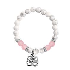 a white and pink beaded bracelet with an elephant charm