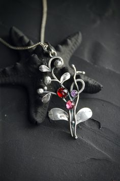 ITEM DESCRIPTION: The size H 5 cm x W 3 cm (2 x 1 1/3 inch). Weight - 6 g. You can buy it with a silver chain or without it. I made this pretty botanical necklace of sterling silver, garnet, rhodolite, and amethyst. It has the shape of a cranberry branch and recreates the wonderful beauty of nature. This plant necklace is really worthy of being in your precious collection. Expect many compliments on this! Ooak jewelry made by eco-friendly materials. This handmade necklace will come to you in a g Silver Plant, Nature Necklace, Leaf Necklace, Stunning Necklace, Copper Color, Nature Jewelry, Wire Wrapped Jewelry, Jewelry Supplies, Handmade Necklaces