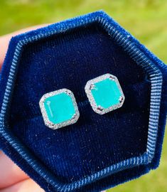 PARAIBA Blue Square Halo Earring Stud Paraiba TOURMALINE Magnificent, Exotic Neon Vivid Blue Color, Neon Glow Blue Paraiba Jewelry 18KGP ♥Ready to ship ♥ The main stone is the Finest Doublet PARAIBA TOURMALINE. ♥Absolutely gorgeous and beautifully handcrafted Finest Doublet PARAIBA TOURMALINE in an exquisite setting. ♥ This classic yet trendy Jewelry makes the perfect Christmas/Anniversary/Valentine's/Birthday gift for her that will be treasured forever. We have confidence that the beautiful and Emerald Green Earrings, Emerald Blue, Types Of Earrings, Paraiba Tourmaline, Halo Earrings, Halo Earrings Studs, Earring Stud, Neon Glow, Valentine Birthday