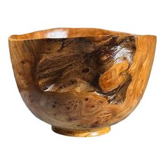 a wooden bowl is shown on a white background