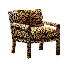 a leopard print chair with arms and legs