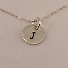 Petite Sterling Silver Personalized Initial Charm Necklace - Hand stamped Dainty Charm Necklace Gift, Everyday Sterling Silver Stamped Necklace, Sterling Silver Charm Necklace Stamped 925 As Gift, Sterling Silver 925 Stamped Charm Necklaces As Gift, Silver Hand Stamped Meaningful Charm Necklace, Small Personalized Sterling Silver Necklace, Meaningful Hand Stamped Sterling Silver Charm Necklaces, Meaningful Hand Stamped Sterling Silver Charm Necklace, Stamped Sterling Silver Jewelry As Gift