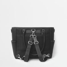 This lightweight structured tote is the perfect work bag, travel bag, and go anywhere bag. It features a spacious and organized interior for your essentials, a padded compartment for a 15 inch laptop (and 16 inch Macbook Pro), side pockets for your drinks, and you can convert it into a backpack or crossbody. Rectangular Nylon Satchel For On-the-go, Modern Laptop Bag With Luggage Sleeve For On-the-go, Modern Travel Bag With Double Handle For On-the-go, Large Capacity Laptop Backpack For On-the-go, Large Capacity Nylon Satchel For On-the-go, Rectangular Nylon Diaper Bag For On-the-go, Functional Diaper Bag With Double Handle For On-the-go, Modern On-the-go Tote Luggage, Modern Tote Diaper Bag For On-the-go