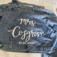 a jean jacket with the words mrs coccognove written on it