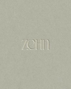 the word zohn written in white on a light gray background with small letters