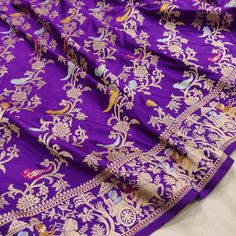 Pure katan silk Handwoven fully kadwa All over gold zari and multicolor resham meenakari aada and bird motifs on body and designer meenakari rath design border and designer pallu weave very much exclusive piece of Banarasi saree Purple Katan Silk Traditional Wear With Meenakari, Purple Dola Silk Dupatta With Meenakari, Purple Meenakari Paithani Silk Traditional Wear, Purple Paithani Silk Saree With Meenakari, Purple Paithani Silk Traditional Wear, Purple Meenakari Traditional Wear For Festivals, Traditional Purple Saree With Meenakari Details, Purple Paithani Silk Traditional Wear For Ceremonies, Purple Meenakari Katan Silk Saree