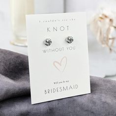 a card that says i couldn't be the knot without you with two hearts on it