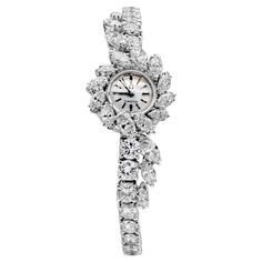 Elegantly made 9 carat total mixed marquise and brilliant round diamond vintage ladies wrist watch. 6.25 inches in length, made in platinum. Signed and made by Omega. Ladies Wrist Watch, Women Wrist Watch, Diamond Watch, Vintage Diamond, Elegant Woman, Vintage Watches, Round Brilliant, Time Piece, Round Diamonds