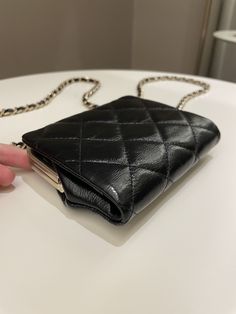 Chanel Quilted Clasp Pouch On ChainBlack Aged Calfskin GHWSize 12 x 10 cmChain drop 55 cm Microchip Sticker Oct 2022New w Seal Includes full set box, dust bag and receiptRTP 4800 sgdPrice now 3350 sgd 2550 usd CN5405-02 Luxury Black Evening Bag With Mobile Phone Holder, Luxury Black Evening Bag For Mobile Phones, Luxury Black Mobile Phone Evening Bag, Evening Crossbody Clutch With Original Box, High-end Black Clutch With Dust Bag, Luxury Black Rectangular Wallet On Chain, Black Compact Luxury Bag, Luxury Black Compact Bag, Luxury Compact Black Bag