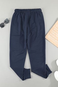 Blue Solid Drawstring Elastic Waist Pants with Pocket Blue Stretch Cotton Sweatpants, Blue Stretch Pants For Leisure, Navy Bottoms For Loungewear In Winter, Casual Blue Leggings For Winter, Blue Stretch Sweatpants For Winter, Casual Elastic Blue Bottoms, Elastic Cotton Blue Bottoms, Stretch Cotton Navy Bottoms, Blue Stretch Cotton Joggers