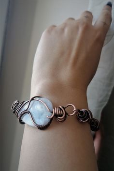 This antiqued copper  chain bracelet has been accurately crafted one link at a time. The bracelet has secure handmade hook clasp. The chain is extremely strong and durable due to the type of links I chose for this bracelet. This lightweight moonstone bracelet are a lovely addition to any wardrobe. It is suitable has an elegant, rustic look to it. This is really striking bracelet for every occasion. This moonstone copper bracelet is formed using traditional wire wrapping techniques and has been oxidized to give it a more antique look. I will cover it with special lacquer for metals. That will help to keep this bracelet bright for a long time. Material: Pure Copper (100%) Moonstone Gemstone Handmade Adjustable Metal Crystal Bracelet, Adjustable Copper Wire Bangle Bracelet, Adjustable Copper Wire Bangle, Handmade Adjustable Rose Gold Crystal Bracelet, Handmade Metal Crystal Bracelet As A Gift, Handmade Moonstone Beaded Bracelets For Gifts, Handmade Moonstone Beaded Bracelets As Gift, Hand Forged Metal Bracelets As Gift, Copper Bracelets With Natural Stones As Gift