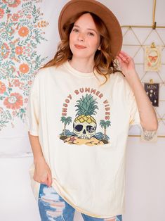 Introducing our Skeleton Beach Shirt - the perfect addition to your summer wardrobe! This stylish and aesthetic t-shirt is perfect for women who love to embrace their edgy side while keeping comfortable during the warmer months. T-Shirt DETAILS -Designs are professionally printed. -Comfortable relaxed fit  -100% Cotton, except heather colors (Cotton Poly blend) -Shirts are a unisex fit, please check the size chart in the images for details. Current processing time:  3-5 Days Shipping Time:  3-5 Days CUSTOM REQUESTS: Currently not accepting unless bulk order(10+ items).  Returns / Defects:  If you are unsatisfied with the shirts' print, please send a photo to my messages.  I am currently accepting returns and exchanges for damaged tees/sweatshirts or print defects.    Let me know if you nee Summer Beach Tops With Skull Print, Beach Skull Print Short Sleeve Top, Skull Print Short Sleeve Beach Top, Casual Skull Print Tops For Vacation, Short Sleeve Skull Print Beach Top, Beach Short Sleeve Top With Skull Print, Vacation Tops With Skull Print And Short Sleeves, Skull Print Cotton Beach Tops, Casual Summer Shirt With Skull Print