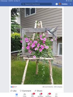 an old ladder with flowers growing out of it is being used as a planter