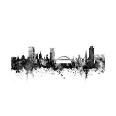 a black and white photo of a cityscape with watercolor splashs on it