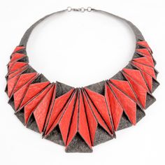 Mixed-Media Necklace - This beautiful, dimensional necklace lays like a collar, standing out for both its structure and shine. Inspired by origami, each piece manipulated by hand and attached to the necklace, not each other, so the necklace can be molded to the wearers neck. Made from hand painted faux leather made from recycled coconut husks, eco friendly, waterproof and an absolute conversation piece! Unique Handmade Geometric Necklace, Handmade Geometric Jewelry For Party, Modern Red Geometric Jewelry, Mixed Media Necklace, Pebble Jewelry, Laser Cut Leather, Chunky Necklaces, Geometric Inspiration, Laser Cut Jewelry