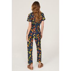 Multicolor printed cotton (100% Cotton). Jumpsuit. Short sleeves. Collar. Front zipper fly with button closure. 58" from shoulder to hemline. 28" inseam. 11.5" rise. 7" leg opening Imported. Spring Casual Multicolor Print Jumpsuits And Rompers, Cotton Floral Print Jumpsuits And Rompers For Loungewear, Cotton Jumpsuits And Rompers With Floral Print For Loungewear, Fitted Cotton Bottoms With All Over Print, Casual Printed Patterned Jumpsuits And Rompers, Spring Multicolor Print Jumpsuits And Rompers, Spring Multicolor Printed Jumpsuits And Rompers, Summer Workwear Printed Jumpsuits And Rompers, Retro Fitted Floral Print Jumpsuits And Rompers