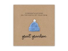 congratulations on the birth of your new grandson with a blue knitted beanie hat