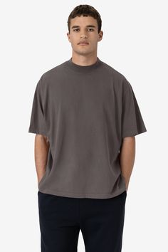 This one-of-a-kind t-shirt is made with comfort in mind. This style features a large sleeve, super high mock neck, and boxy, wide fit around the body. Made of our classic 18 singles open-end jersey, just like the essential 1801GD. Wear with jeans, sweats, or bike shorts for a perfectly oversized look. We recommend ordering 1 size up from your usual size. Garment dyed and enzyme washed for shrink-free, worn-in finish. This item is a garment dye product. Garment dye items can be distinguished by ‚ Oversized Cotton Turtleneck Top, Casual Cotton Turtleneck T-shirt, Relaxed Fit Funnel Neck Top, Casual Turtleneck T-shirt With Relaxed Fit, Solid Color Funnel Neck Top With Relaxed Fit, Relaxed Fit Cotton Funnel Neck Top, Cotton Funnel Neck Top With Relaxed Fit, Casual Relaxed Fit Mock Neck Top, Relaxed Fit Turtleneck Top For Streetwear