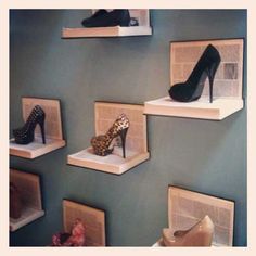 several pairs of high heeled shoes are on display