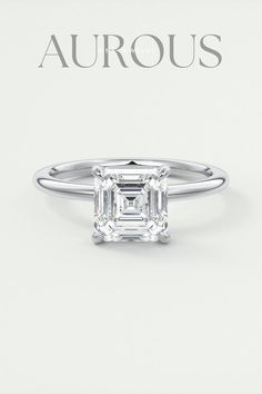 a diamond ring with the words crown moissantee on it's side