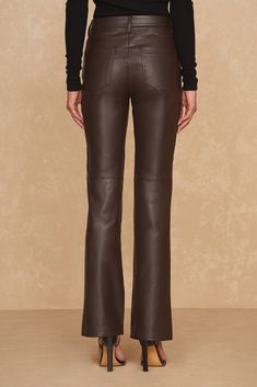 The Kai Pant is a faux leather Fall essential. With a flattering high-rise and skinny-flare silhouette that gives you legs for days, this signature pant is a must for on-trend style. Featuring silver hardware and luxuriously soft, ultra stretchy faux leather, this pant looks incredible on everyone. Leather Pant, Fall Essentials, Trend Style, Sports Accessories, Silver Hardware, Jumpsuit Dress, Best Sellers, Espresso, High Rise