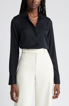 This versatile button-up blouse is irresistibly updated in luxe stretch silk with easy-moving back pleats and a tuckable high/low hem. 27" length (size Medium) Front button closure Spread collar Long sleeves with single-button cuffs Back yoke with box pleat 92% silk, 8% spandex Dry clean or hand wash, line dry Imported Individualist Black Blouse Outfit Office, Formal Viscose Tops With Button Closure, Sleek Silk Button-up Top, Viscose Tops With Button Closure For Formal Occasions, Sleek Silk Blouse For Work, Sleek Silk Workwear Blouse, Fitted Button-up Viscose Blouse, Fitted Viscose Button-up Blouse, Sleek Silk Top With Button Closure