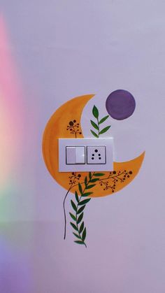 the light switch is decorated with flowers and leaves on an orange crescent shaped wall plate