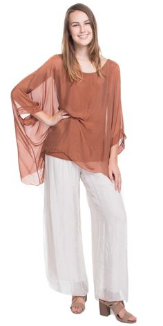 Our best seller 100% Silk Solid Kaftan Style Blouse in 20 different colors! Such a nice Style with a Gorgeous Exotic Look! 100% Silk One Size | OS Made in Italy Kaftan Blouse, Kaftan Style, Silk Kaftan, Nice Style, Style Blouse, Best Seller, Different Colors, Bell Sleeve Top, Rust