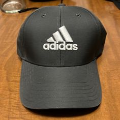 Never Worn Classic Black Baseball Cap For Sports, Classic Black Hat For Baseball Season, Adidas Casual Hat For Sports Events, Casual Adidas Hat For Sports Events, Black Baseball Cap For Baseball Season, Black Casual Baseball Cap For Sports Events, Sporty Black Hat For Baseball Season, Adidas Black Baseball Cap For Sports, Adidas Black Visor Hat