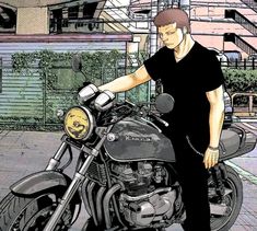 a man standing next to a parked motorcycle