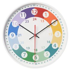 a white clock with multicolored numbers on it