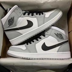 Air Jordan 1 Mid Light Smoke Grey Jordan 1 Shoes For Women, Jordan 1 Smoked Grey Mid Outfit, Grey Nike High Tops, Cool Nike Shoes Women Sneakers, All Nike Shoes Women, Aesthetic Air Jordans, Jordans 1 Smokey Grey, Good Nike Shoes, Nike Jorden1