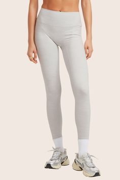 Experience style and comfort with the 2024 FormCloud™ Leggings in Heather Grey. These high-waisted leggings offer a smooth texture, medium compression, and are made from our proprietary FormCloud™ fabric. With no side or front seams, they provide a sleek look for your active pursuits. Fitted Solid Leggings In Recycled Polyester, Gray Activewear With Light Support And Micro-elastic Fit, Versatile Gray Compression Activewear, Versatile Full-length Gray Leggings, Versatile Gray Full-length Leggings, Versatile Full Length Gray Leggings, Versatile Compression Tights With Light Support, Compressive Gray Elastane Tights, Gray Elastic Elastane Leggings