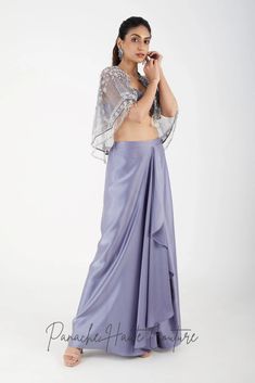 Grey Color Dhoti Skirt with Cape – Panache Haute Couture Silk Sets With Cape Sleeves For Evening, Traditional Tissue Silk Evening Set, Traditional Evening Sets In Tissue Silk, Traditional Evening Tissue Silk Sets, Silk Evening Sets With Cape Sleeves, Silk Evening Set With Cape Sleeves, Elegant Organza Choli With Cape Sleeves, Silk Set With Cape Sleeves For Party, Silk Sets With Cape Sleeves For Party