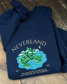 embroidered sweatshirt/tshirt. This design is on a Navy garment with multicoliured threading. If you'd like this design on a different colour sweatshirt and/or with different thread colour(s), please message me first to check availability before ordering. All of our sweatshirts are a 50% cotton/50% polyester blend, and are slightly oversized/unisex! Please check the sizing chart before ordering. fleeces sizing: Rough sizing guide for an OVERSIZED fit (U.K. size) - please size down if you don't w Embroidered Sweatshirt, Embroidered Sweatshirts, Zip Sweatshirt, Sizing Chart, Etsy Australia, Little Gifts, Gift Guide, Gender Neutral, Adult Outfits