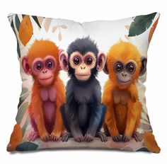 three monkeys are sitting on the pillow