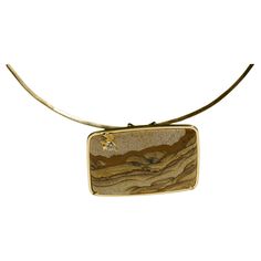 Roland Schad Landscape Agate Torque and Pendant in yellow gold, landscape agate framed in gold and set with a yellow diamond, unique piece, maker's mark, circa 1970 Torque by Thierry Vendome in additional ABOUT the CREATOR French-Swiss jewelry designer, famous in the 70s and 80s, Roland Schad, uses raw gems or old engraved stones, and creates meanders of unpolished green and yellow gold around them. This is an amazing example of chinese glytic of turquoise, really difficult to find. For Vintage Gold Landscape, Stone Engraving, International Jewelry, Maker's Mark, Jewelry Designer, Agate Pendant, Yellow Diamond, Makers Mark, Jewelry Art