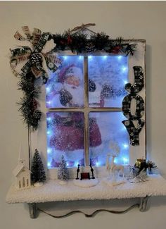 a window decorated with christmas lights and decorations