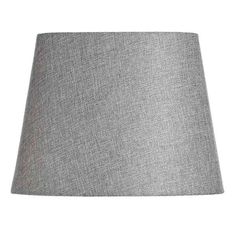 a grey lamp shade on a white background