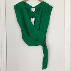 Green Wrap Shirt With Belt Buckle Detail. Green Summer Blouse For Work, Green Spring Tops For Work, Spring Green Tops For Workwear, Spring Green Tops For Work, Chic Green Tops For Work, Chic Green Top For Work, Sleeveless Green Blouse For Brunch, Wrap Around Shirt, Shirt With Belt