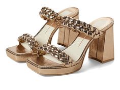 Dolce Vita Ashby - Women's Shoes : Dark Gold Crackled Stella : Don a statement look styling with the fashionable Dolce Vita sandals and grab the attention everywhere you go. Synthetic upper. Synthetic lining and comfortable footbed. Braided style detailing. Square toe. Chunky block heel. Synthetic outsole. Imported. Heel height: 3.5 in. Platform height: 0.63 in. High Heel Sandals With Textured Footbed, Trendy Block Heel Sandals With Cushioned Footbed, Synthetic Sandals With Textured Footbed And Block Heel, Chic Mules With Textured Footbed And Round Toe, Gold Block Heel Mules For Summer, Chic Round Toe Mules With Textured Footbed, Chic Wedge Heels With Textured Footbed, Synthetic High Heels With Textured Footbed, Trendy Gold Sandals With Block Heel