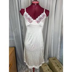 vintage knee length lace bust nightgown slip sz 32 beautiful white satin knee length slip with lace on the top half of the bust. Fitted Slip Dress With Built-in Bra For Wedding, Elegant Satin Sleepwear With Built-in Bra, Elegant Camisole Nightgown With Built-in Bra, Fitted Bodice Slip Dress With Spaghetti Straps For Daywear, Elegant Stretch Slip Dress For Loungewear, Elegant Fitted Sheer Slip Dress, Fitted Satin Camisole Nightgown, Satin Camisole Nightgown, Elegant Summer Chemise For Wedding Night