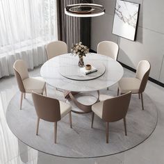 a dining room table with chairs around it