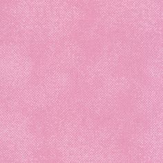 a pink background with small dots