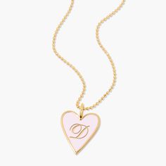 The Margaret Enamel Heart Pendant will add a touch of love to your look. Crafted with a shining enamel finish, this pendant is sure to make your outfit beat with style! (See what we did there?) It's perfect for showing your love and your fashion sense at the same time. Enamel filled pendant measures 3/4"x1", gold plated sterling silver 16" brass diamond cut ball chain with 2" extender Lobster claw closure With engraving this item is FINAL SALE SKU: BYN1439 60s Girl, Initial Charm Bracelet, Modern Jewellery Design, Dream Gift, Heart Pendant Gold, Enamel Necklaces, Jewelry Lookbook, I Love Jewelry, Purse Jewelry