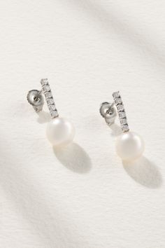 Mizuki's earrings are adorned with shiny Akoya pearls. They're cast from 18-karat white gold and dangle from a row of sparkling diamonds. Wear yours with other elegant pieces from the collection. Luxury Diamond Earrings With Pearl Drop, Luxury White Pearl Diamond Earrings, Luxury Pearl Diamond Earrings With Diamond Accents, Luxury Diamond White Diamond Earrings With Pearl Drop, Akoya Pearl Diamond Earrings With Diamond Accents For Evening, Luxury White Diamond Earrings With Pearls, Luxury Pearl Diamond Earrings In Diamond White, Luxury Pearl Diamond White Earrings, White Gold Akoya Pearl Dangle Earrings