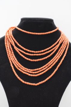 Elegant Single Strand Coral Beads, Traditional Single Strand Coral Jewelry, Elegant Coral Polished Beads, Traditional Coral Necklace With Gemstone Beads, Traditional Coral Necklace With Polished Beads, Traditional Coral Necklace With Large Beads, Traditional Coral Beaded Necklaces, Traditional Coral Beaded Necklaces With Colorful Beads, Traditional Coral Beaded Necklaces With Polished Beads